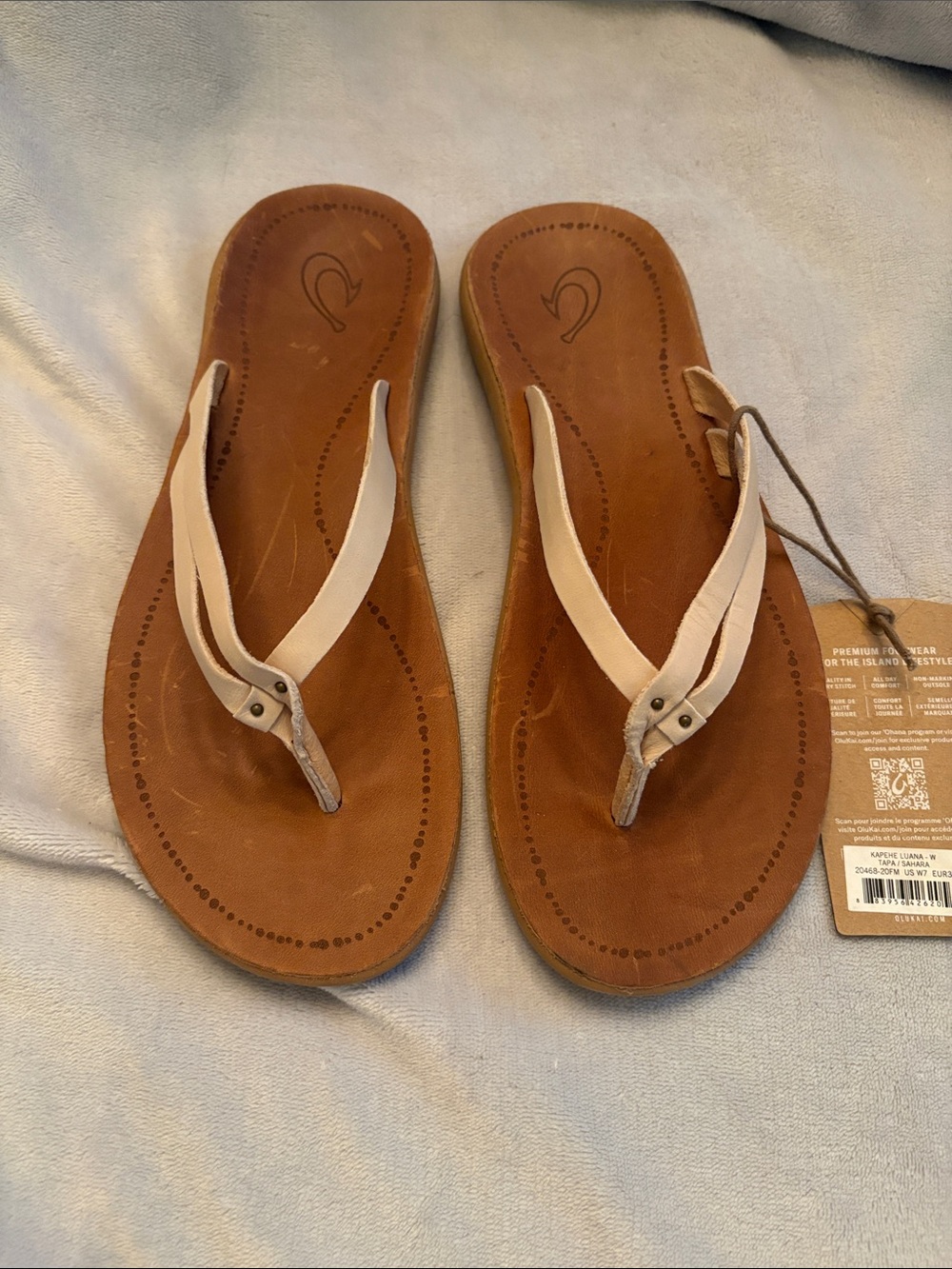 OluKai Brown Leather Flip Flop Sandals with Cream Straps